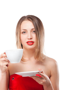 年輕漂亮的金發(fā)女人喝茶