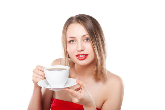 年輕漂亮的金發(fā)女人喝茶