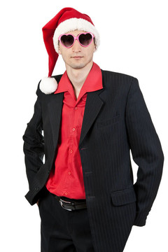 商人在Santa戴帽子和太陽鏡