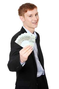 年輕英俊的商人控股歐元