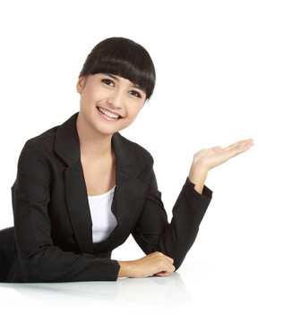 漂亮的商人用手拿東西
