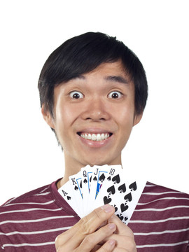 亞洲青年男子持撲克牌