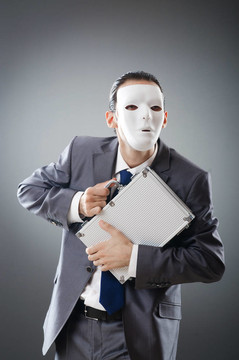 工業(yè)espionate概念與蒙面的商人