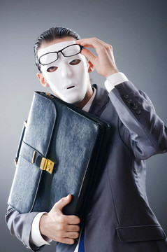 工業(yè)espionate概念與蒙面的商人