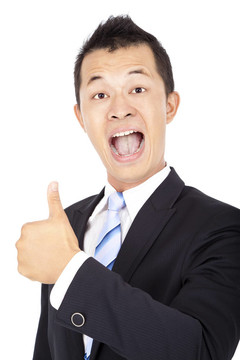 快樂的亞洲商人用拇指孤立白色
