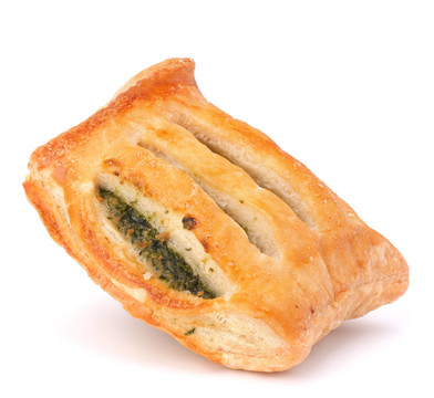 白色背景上的酥皮小圓面包。