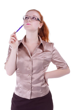 戴眼鏡和鋼筆的商業(yè)婦女