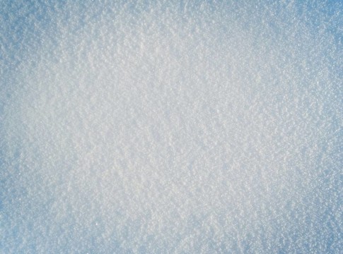 新鮮白雪的特寫(xiě)圖像。雪的背景