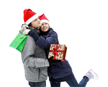 Santa帽子戶外送禮年輕夫婦孤立在白色吸引人