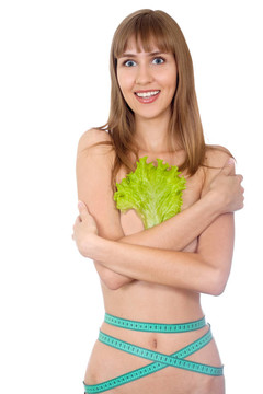 美麗的女孩生菜和卷尺孤立