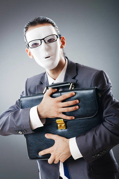 工業(yè)espionate概念與蒙面的商人