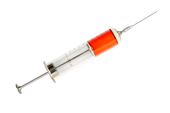 舊玻璃注射器和疫苗