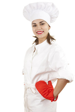 年輕女廚師白色制服和帽子與紅色廚房手套