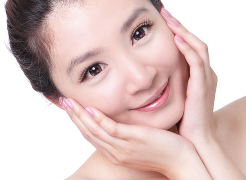 護(hù)膚女人微笑和手觸摸臉