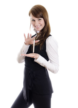 開朗有魅力的女人用圓珠筆。白色隔離。