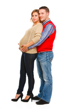 男人抱著她懷孕妻子的完整畫像