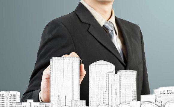 生意人畫建筑和城市景觀