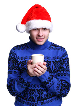 男子在Santa的帽子與杯子