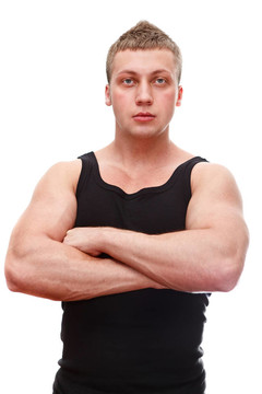 一個英俊的白人男子在黑色T恤musculan雙手對乳腺孤立在白色背景
