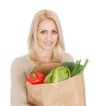 漂亮的女人與食品袋