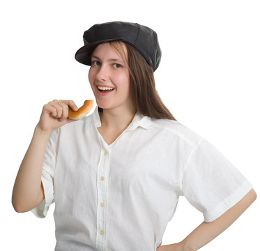 在帽手里拿著一個面包圈一個淘氣的女孩肖像