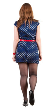 黑發(fā)女人去藍(lán)色衣服的背影。