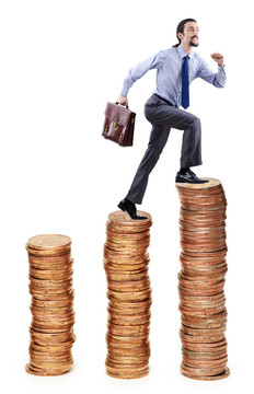 商人爬金幣堆