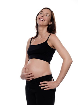 懷孕白人婦女的肖像笑快樂的白色背景孤立的工作室