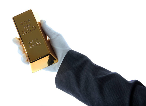 商人手中的金條