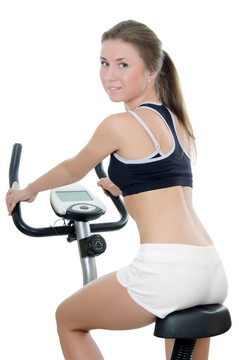 女孩是從事一個velosimulator
