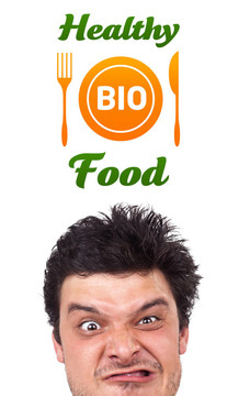 年輕的頭看著健康食品的跡象
