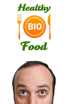 年輕的頭看著健康食品的跡象