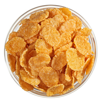 玉米片堆在一個(gè)玻璃碗；白色