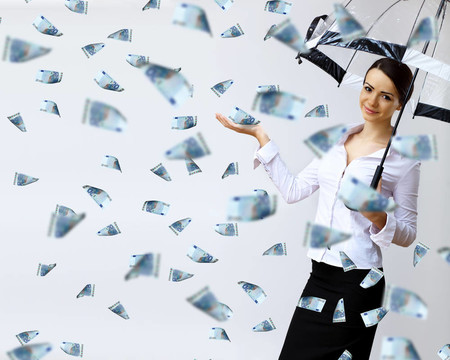 商業(yè)婦女傘下的金錢雨