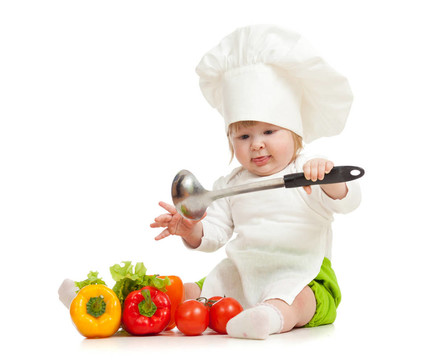 孩子在廚師帽與健康食品蔬菜