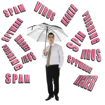 互聯(lián)網(wǎng)安全字和商業(yè)人與傘
