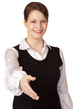 漂亮的女商人給手握手。