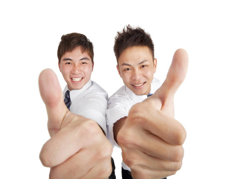 兩個(gè)快樂(lè)的亞洲商人豎起大拇指