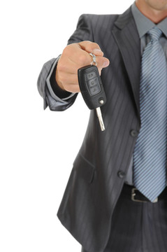 商人給汽車鑰匙