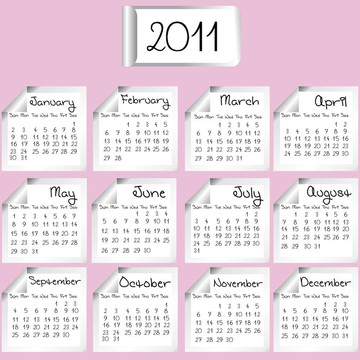 2011日歷在粉紅色背景上的白床單
