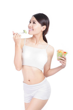 少女笑著吃沙拉