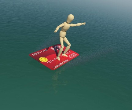 信用卡上的木頭人是浮在水的沖浪者的態(tài)度。3D渲染