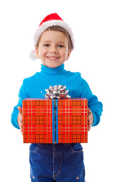 小男孩在Santa的帽子與禮物