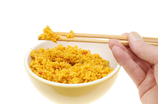 手握筷子和米飯