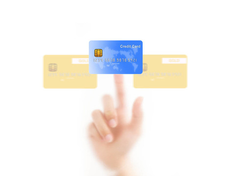 用手指壓著信用卡；在白色背景上孤立。