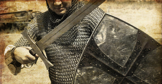 骑士与剑的照片。旧图像风格照片。