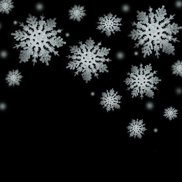 黑色背景上柔和的銀色雪花