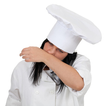 在白色的制服和帽子與下賤的女廚師；流鼻涕