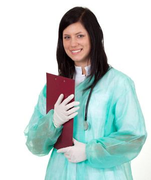 用聽(tīng)診器持空白綠色工作服的女醫(yī)生剪貼板