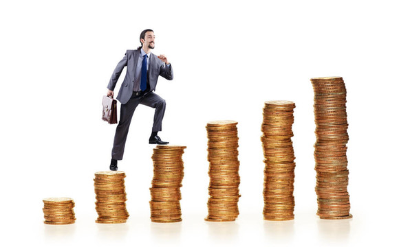 商人爬金幣堆